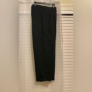 IZOD 100% Polyester, cuffed Slacks, black size 38/32.